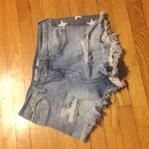 Ripped American flag jean shorts